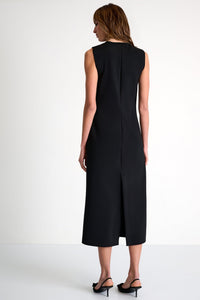 Woman wearing a black sleeveless dress on a white background